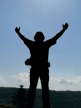 Hero on mountain top Stock Photos