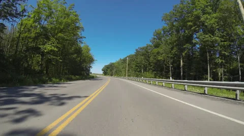 HERO3_Car pov while driving on streets, hwy, through tunnels on sunny day Stock-Footage 24974430