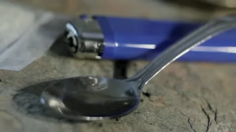 Heroin syringe Stock Footage 18893319