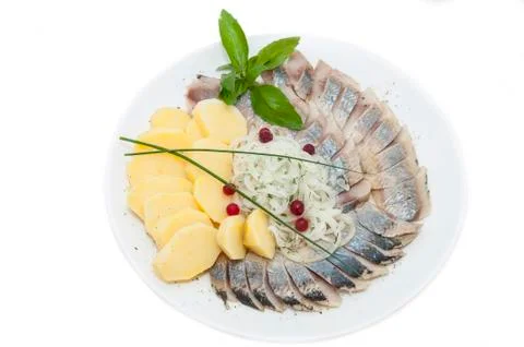 Herring and potatoes Stock Photos