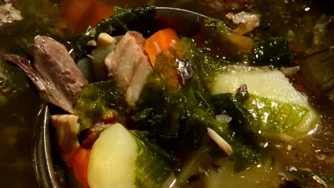 Herring fish soup with nettle Stock Footage 321396791