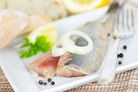 Herring on a plate Stock Photos