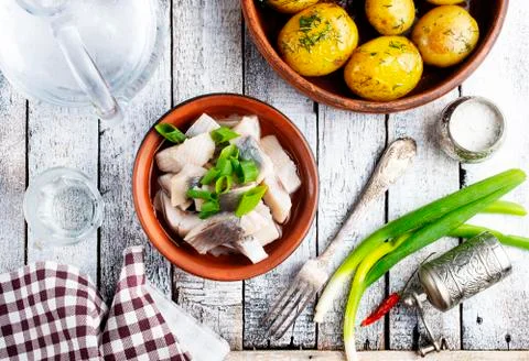 Herring with potato Stock Photos
