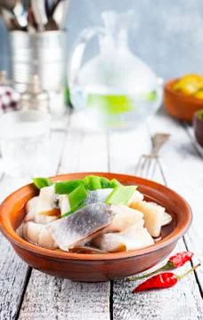 Herring with potato Stock Photos