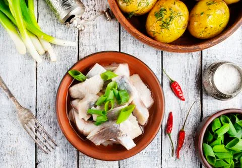 Herring with potato Stock Photos
