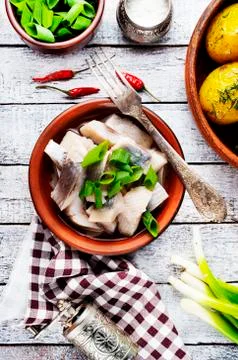 Herring with potato Stock Photos