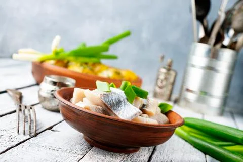 Herring with potato Stock Photos