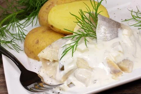 Herring with potatoes Stock Photos
