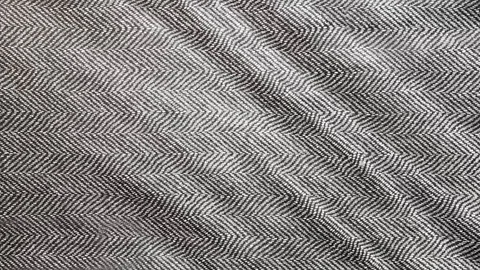 Herringbone background, macro shot of tweed fabric cloth. Stock Footage 108970040
