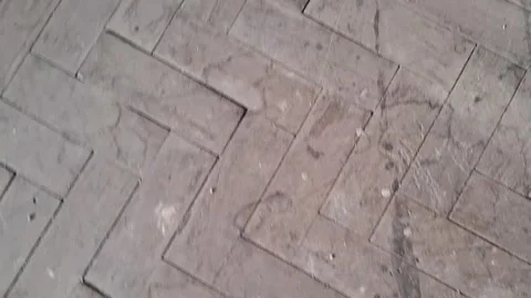 Herringbone pattern grey stone floor texture moving in motion video Video stock 337897035