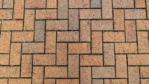 Herringbone Pattern Orange Brick Pavement Surface Texture 写真素材