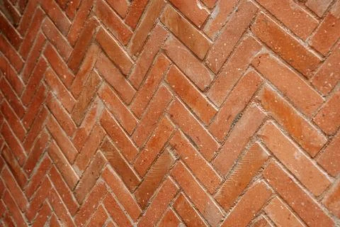Herringbone pattern red brick wall Stock Photos