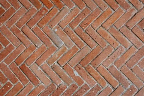 Herringbone pattern red brick wall Stock Photos