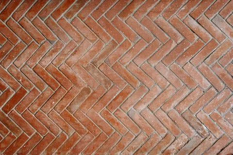 Herringbone pattern red brick wall Stock Photos