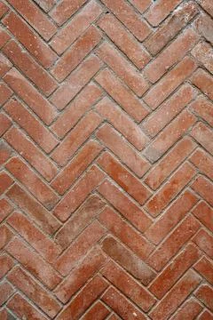 Herringbone pattern red brick wall Stock Photos