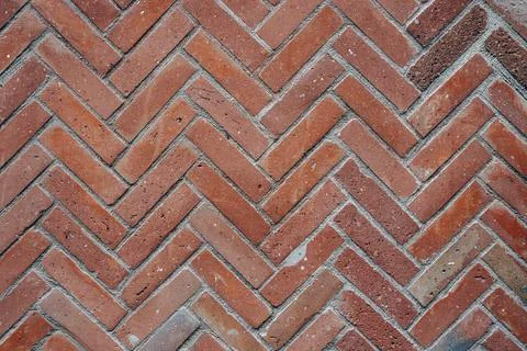 Herringbone pattern red brick wall Stock Photos