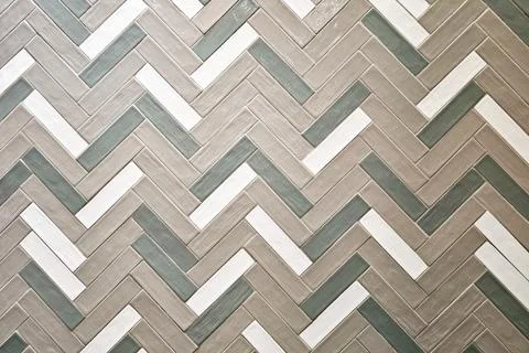 Herringbone Pattern Wall Tiles Featuring a Blend of Warm Beige. Stock Photos