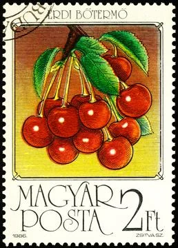 ?herry on postage stamp Stock Photos