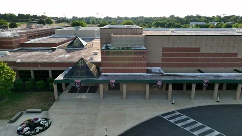 Hershey High School. Aerial pullback reveal of exterior, front of building Stock Footage 207963676