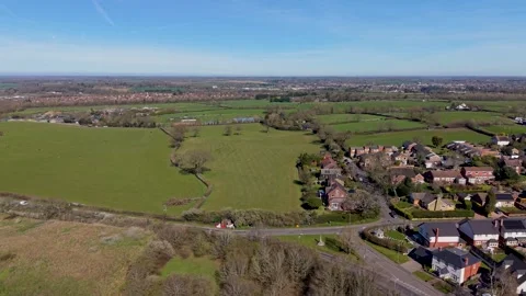 Hertford Heath drone pullback revealing war memorial at London Road and Stock Footage 332609325