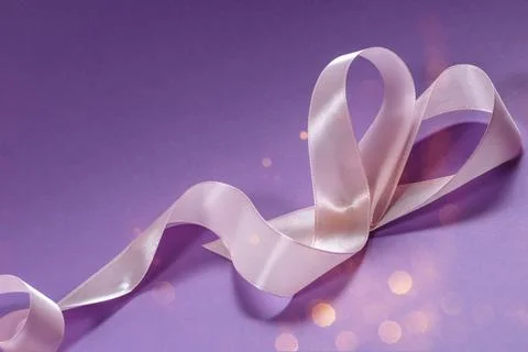 Herts with sequins on a violet background. Stock Photos