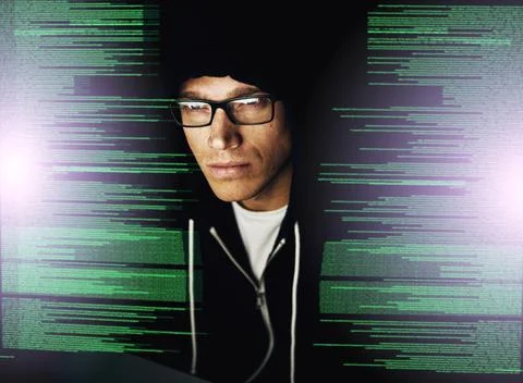 Hes called the uncrackable hacker because he cracks the uncrackable. Cropped Stock Photos