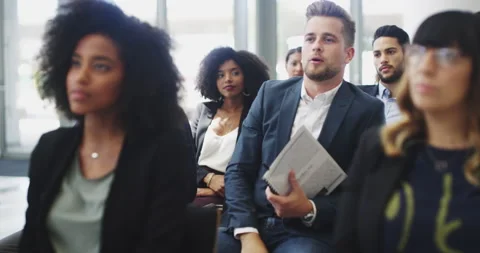 Hes taking an interactive approach to learning. 4k video footage of a handsome Stock Footage 179498008