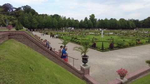 Het Loo Palace gardens. People going down stairs, Netherlands August 15 2022 Stock Footage 296801126