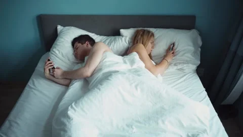 Heterosexual couple having problem in bed. Man and women fabbing and doesn't pay Stock Footage 235495953