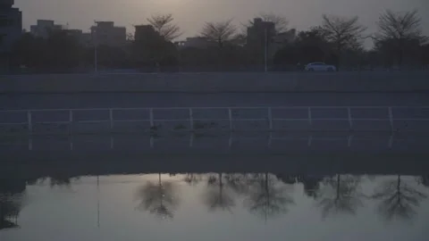 Heti Trail, Car Driving, Sunset, Reflection Stock Footage 236288988