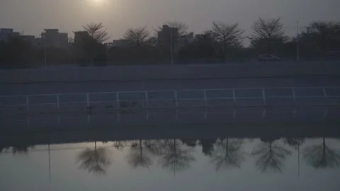 Heti Trail, Car Driving, Sunset, Reflection Stock Footage 236289035