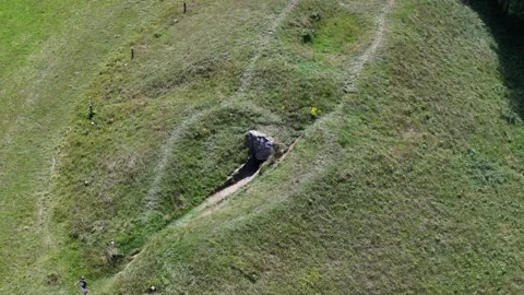 Hetty Pegalr's Tump Close-Up Drone Clip, Neolithic, Gloucestershire 4K Stock Footage 249759802