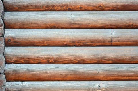 Hewn timber. Rustic log wall horizontal timber background Stock Photos