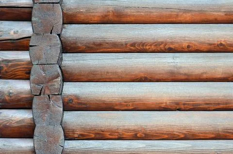 Hewn timber. Rustic log wall horizontal timber background Stock Photos
