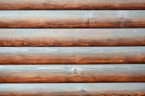 Hewn timber. Rustic log wall horizontal timber background Stock Photos