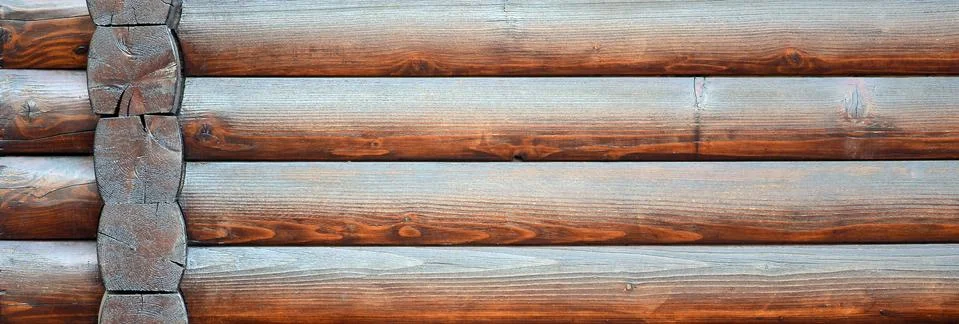 Hewn timber. Rustic log wall horizontal timber background Stock Photos