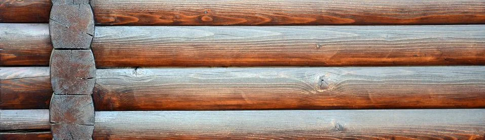 Hewn timber. Rustic log wall horizontal timber background Stock Photos