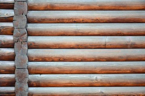 Hewn timber. Rustic log wall horizontal timber background Stock Photos