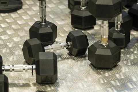 Hex Dumbbells Display in Sporting Goods Store Фото
