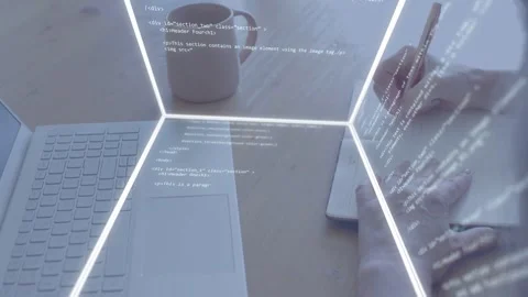 Hex grid appearing, hands writing notes while code streaming across laptop and Stock Footage 333529004
