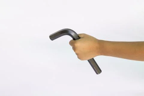 Hex key on hand isolated Stock Photos