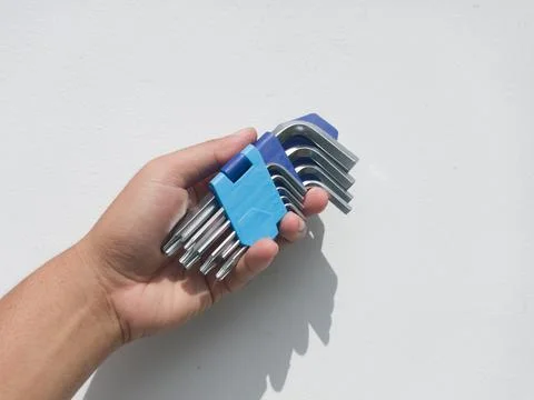 Hex key set in hand 스톡 사진