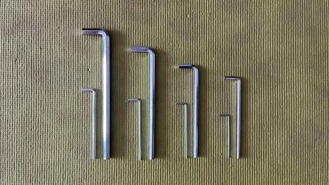 Hex keys on textured background Stock Photos