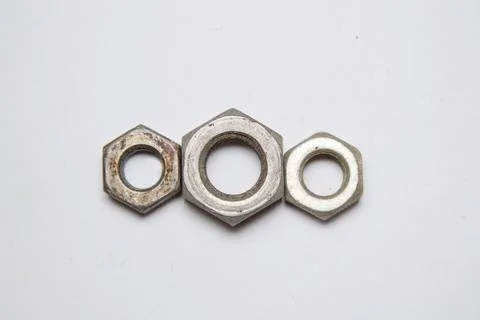 Hex nuts on white background Stock Photos