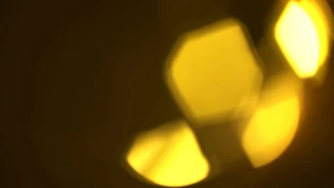 Hexagon Bokeh Light Leaks 4K - Overlay this on your footage to produce beauti Stock Footage 89079542
