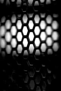 Hexagon metallic texture and pattern. Black and white photography Stock Photos