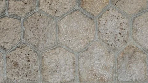 Hexagon-shaped stone wall texture Stock Photos
