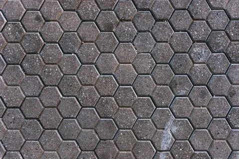 Hexagonal concrete pavement tiles background Stock Photos