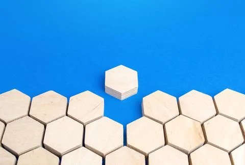 Hexagonal figure emerges from holistic structure. Leave the line, exit the sy Stock Photos