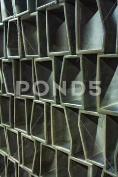 Photograph: Hexagonal grid. Interior wall panel, wood or cement texture ...
